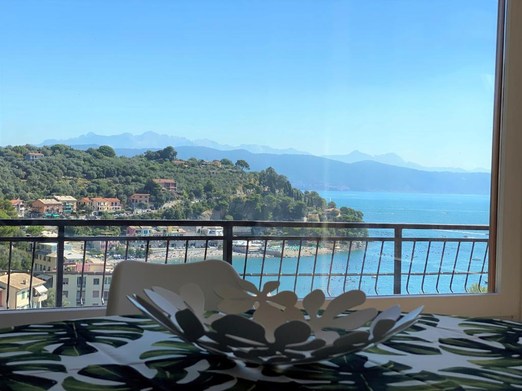 a room with a view of the ocean from a balcony at CaseMaggi Sea View Terrace in Portovenere