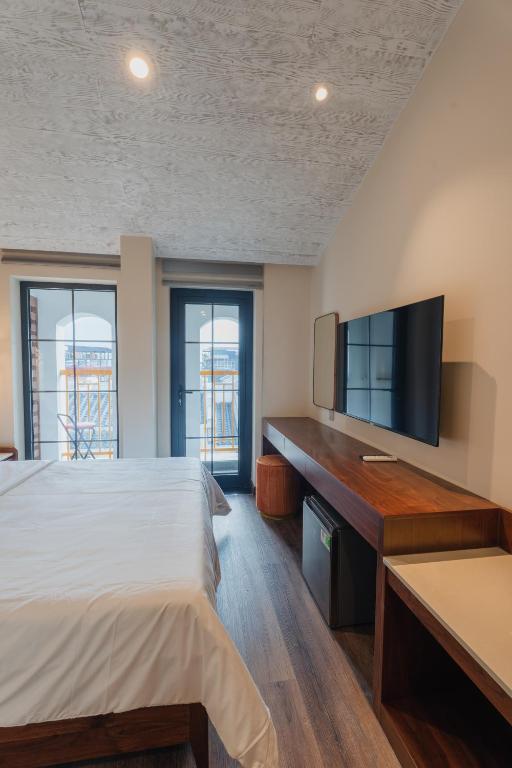 Postel nebo postele na pokoji v ubytování May Casa