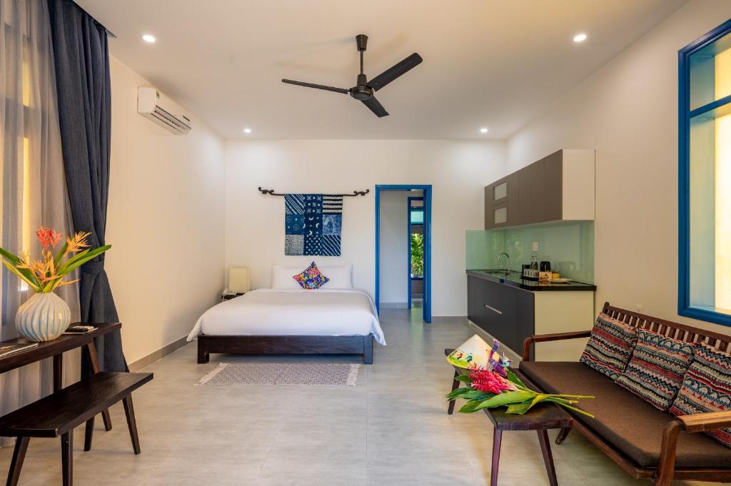 Postel nebo postele na pokoji v ubytování Chez Mimosa Hoi An - LUA Retreat
