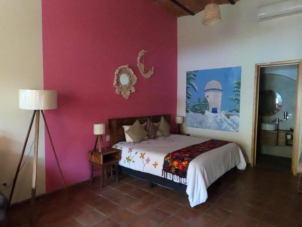 Postel nebo postele na pokoji v ubytování Hotel Boutique Sol y Luna SPA