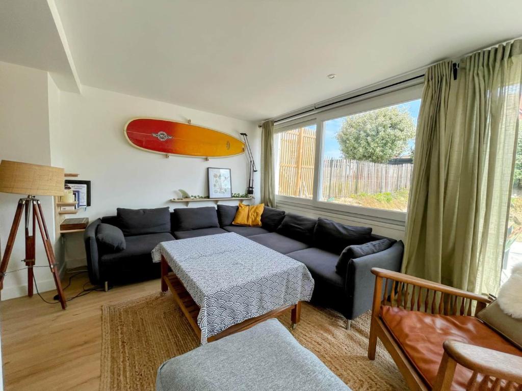 Posedenie v ubytovaní Le BeachHaus - Appartement avec Jardin a 100m de la Mer