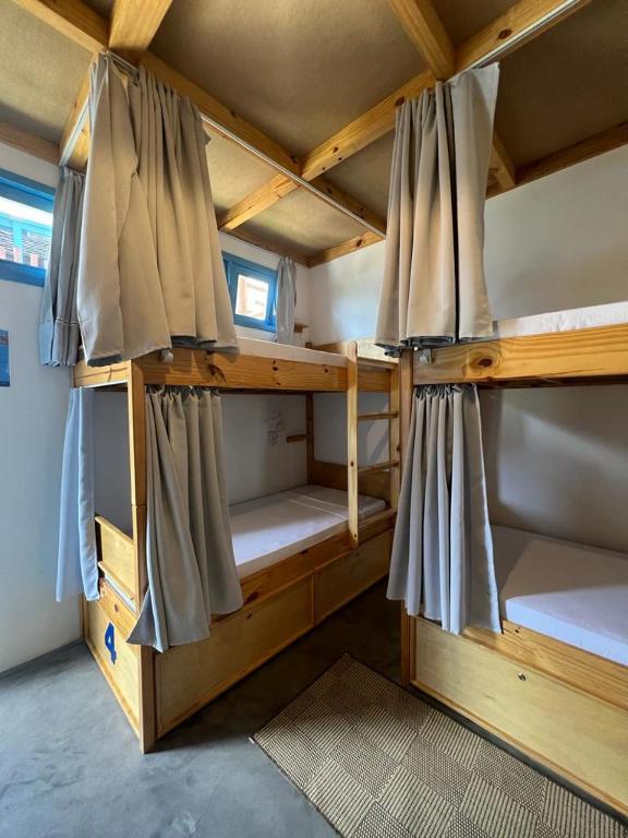 Postel nebo postele na pokoji v ubytování MAKTUB PREA HOSTEL