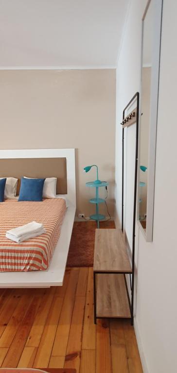 Postel nebo postele na pokoji v ubytování A-Típica GuestHouse