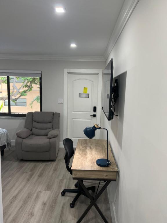 TV a/nebo společenská místnost v ubytování SEA ECHO APPARTMENT MOTEL