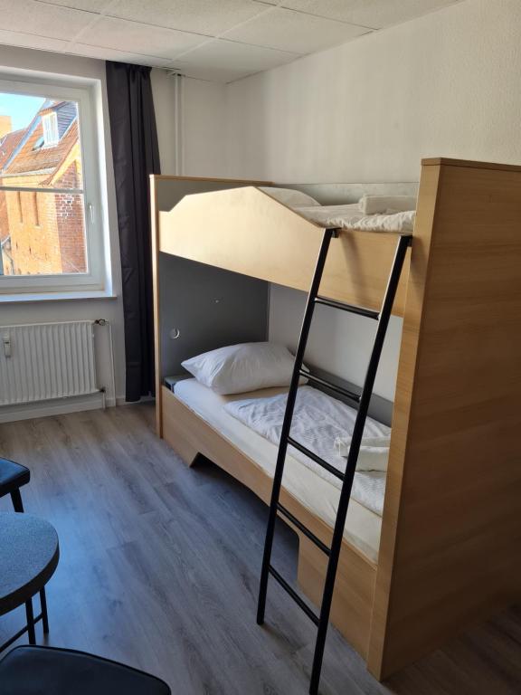 Postel nebo postele na pokoji v ubytování Hotel KO15