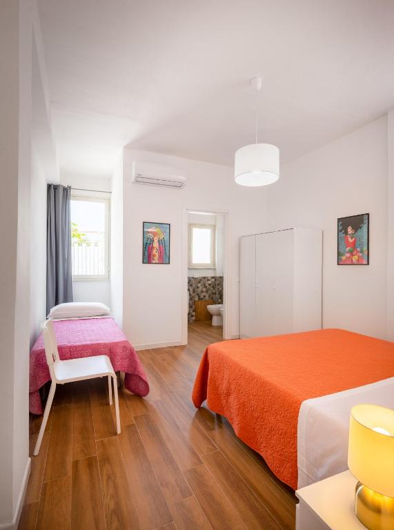Posteľ alebo postele v izbe v ubytovaní Arricàmpati Villa & Bringo Car Rental