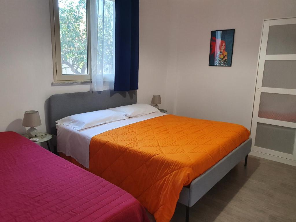 Posteľ alebo postele v izbe v ubytovaní Arricàmpati Villa & Bringo Car Rental