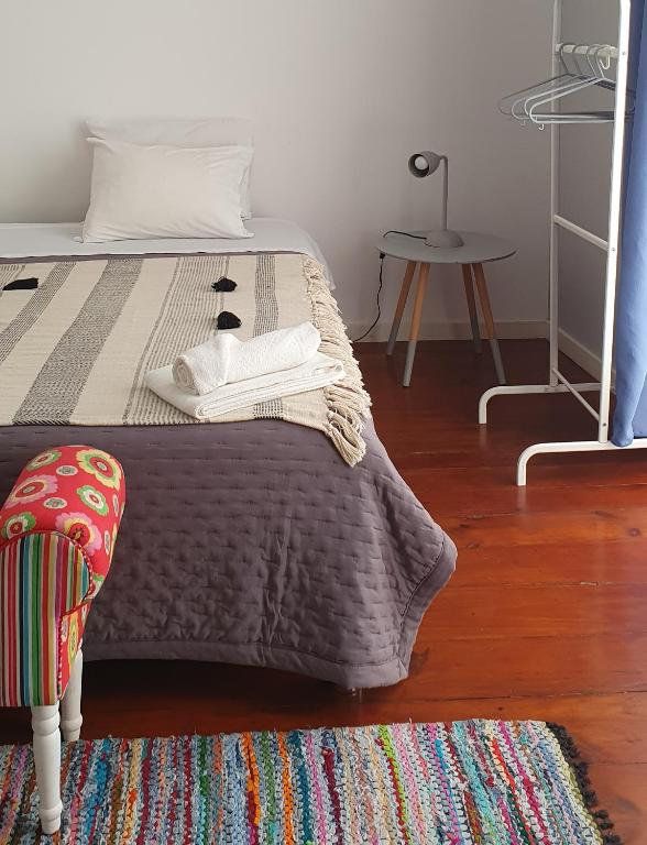 Postel nebo postele na pokoji v ubytování A-Típica GuestHouse
