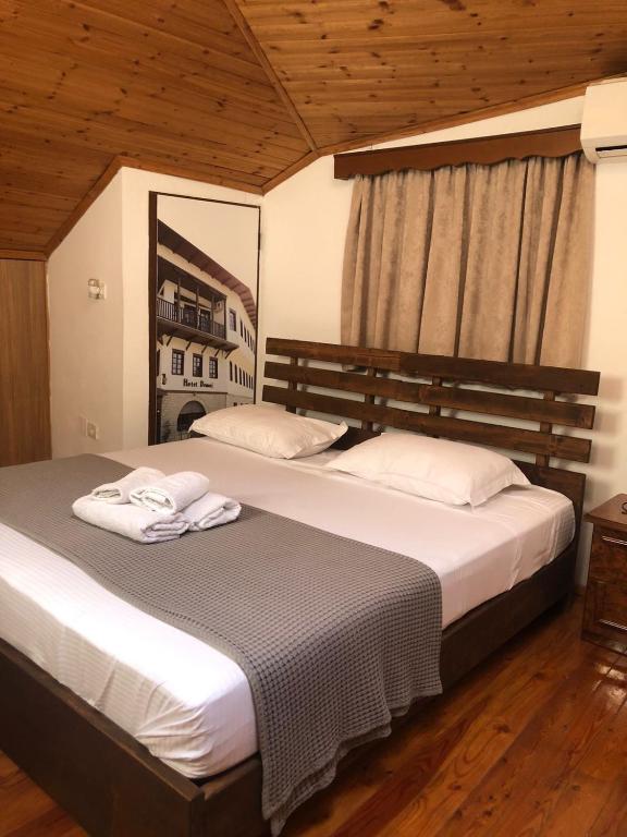 Postel nebo postele na pokoji v ubytování Hotel Demaj