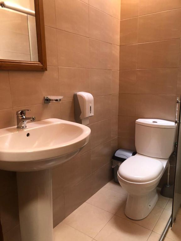 Koupelna v ubytování Hotel Demaj