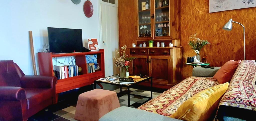 TV a/nebo společenská místnost v ubytování A-Típica GuestHouse