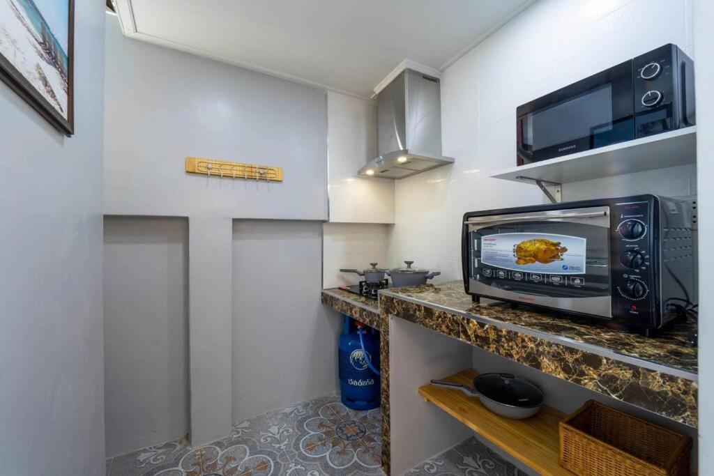 Kuchyň nebo kuchyňský kout v ubytování Come Home Beach Villa, 3 Bedrooms CA3