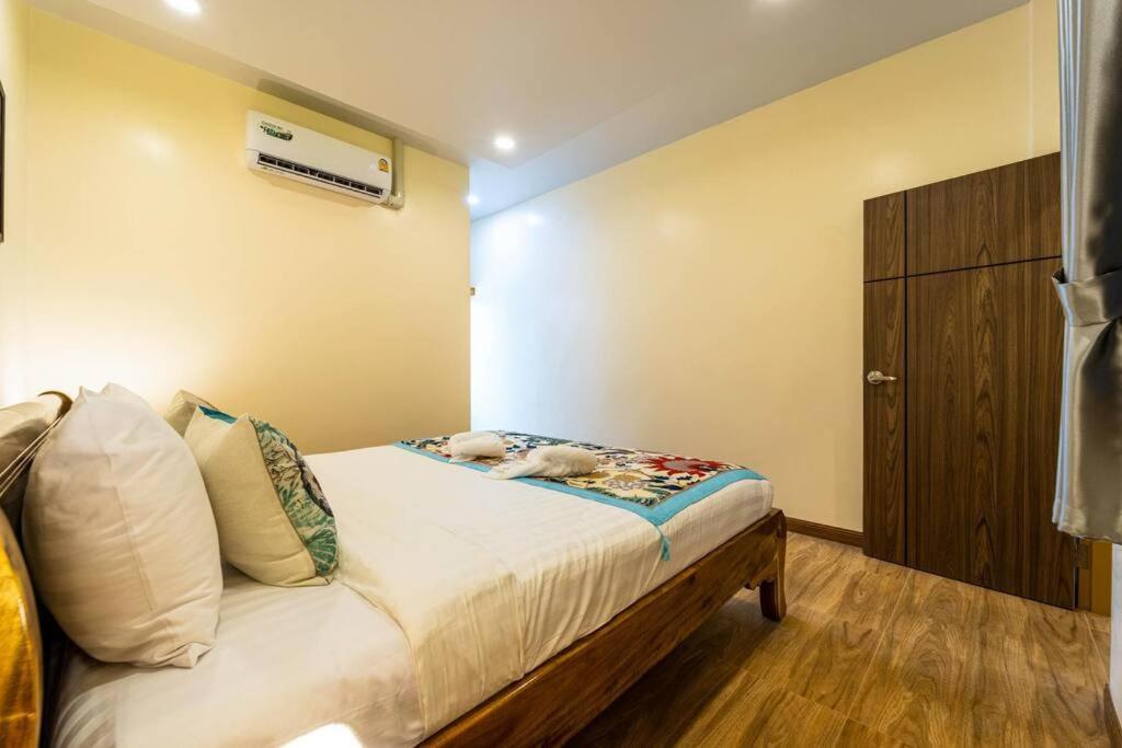 Postel nebo postele na pokoji v ubytování Come Home Beach Villa, 3 Bedrooms CA3