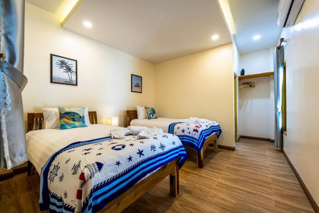 Postel nebo postele na pokoji v ubytování Come Home Beach Villa, 3 Bedrooms CA3