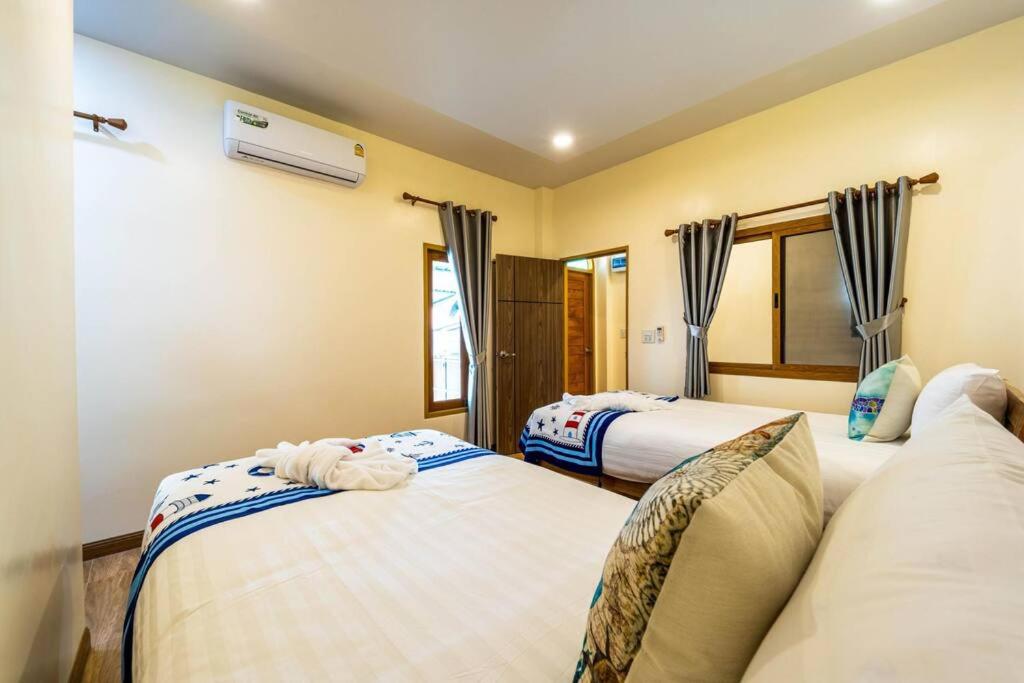 Postel nebo postele na pokoji v ubytování Come Home Beach Villa, 3 Bedrooms CA3