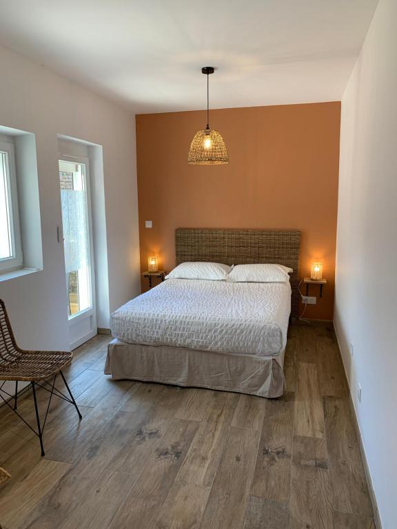 Postel nebo postele na pokoji v ubytování COTTAGE DU PARC