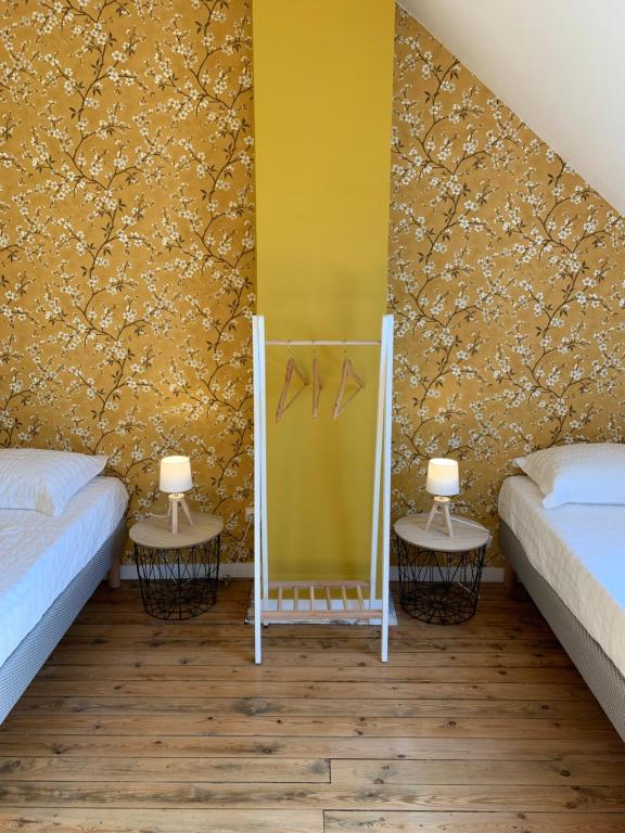 Postel nebo postele na pokoji v ubytování COTTAGE DU PARC