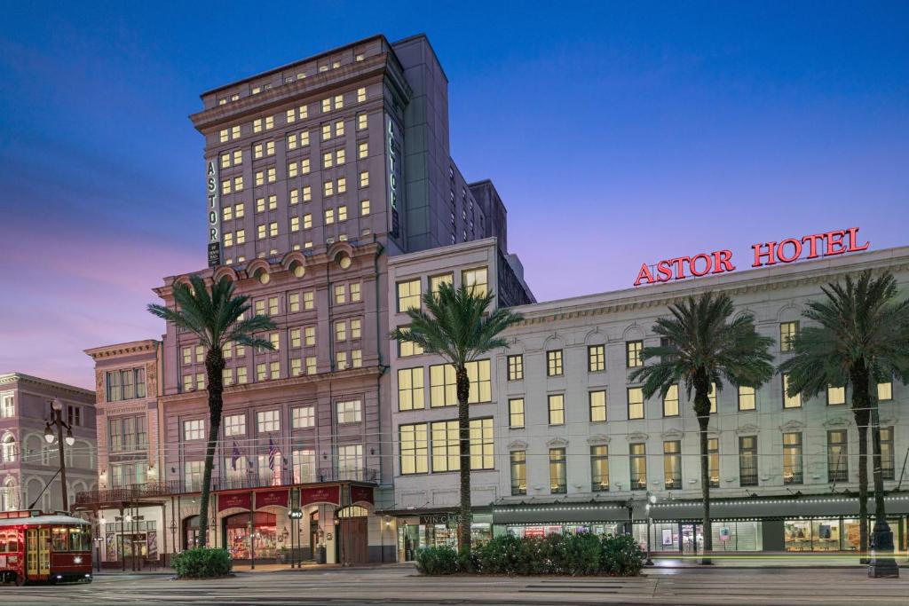 a rendering of the exterior of a star hotel at Astor Crowne Plaza, Corner of Canal and Bourbon in New Orleans