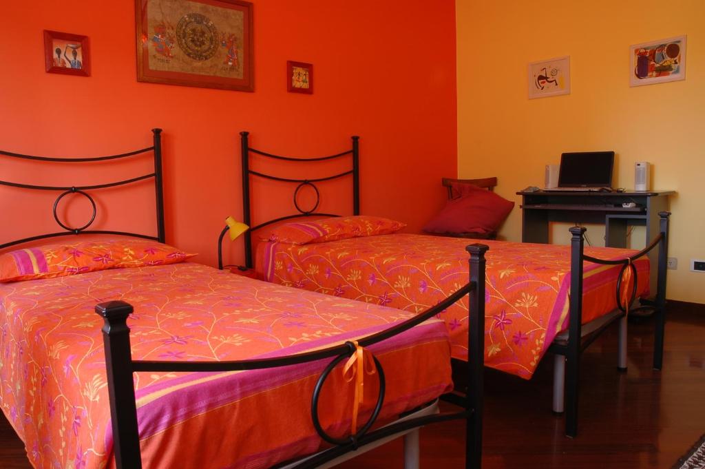 Postel nebo postele na pokoji v ubytování Liana Guest House