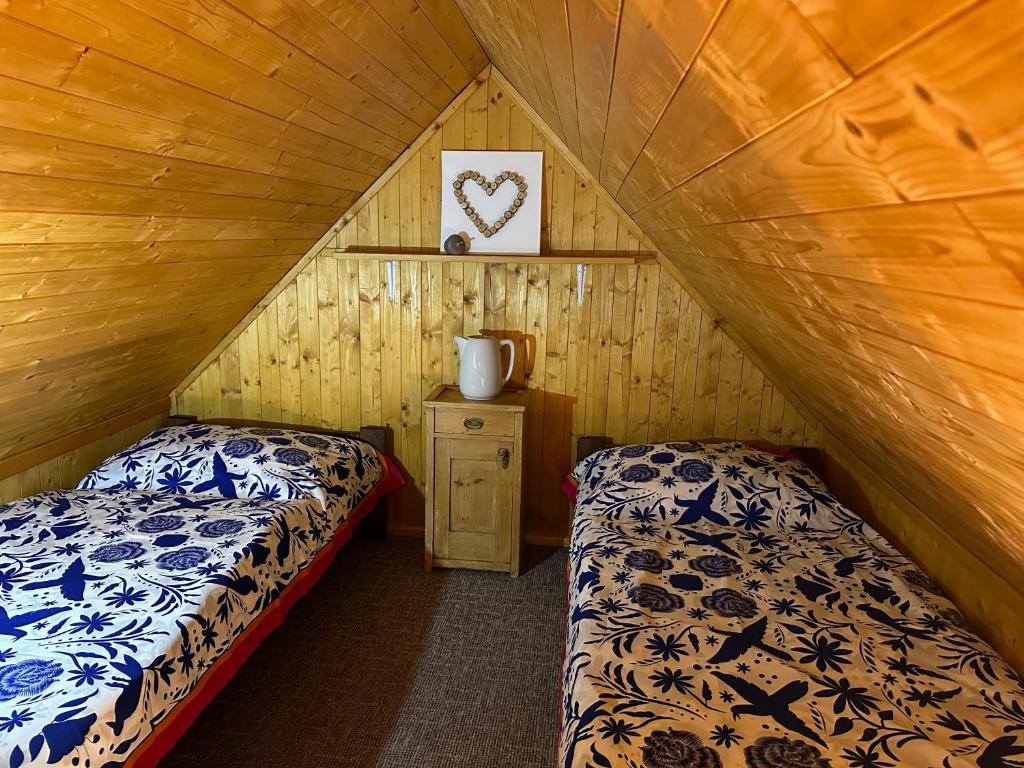 Postel nebo postele na pokoji v ubytování Apartmany Silver