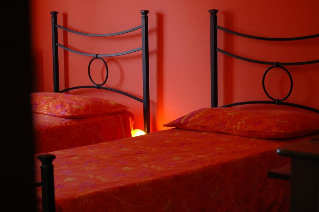Postel nebo postele na pokoji v ubytování Liana Guest House