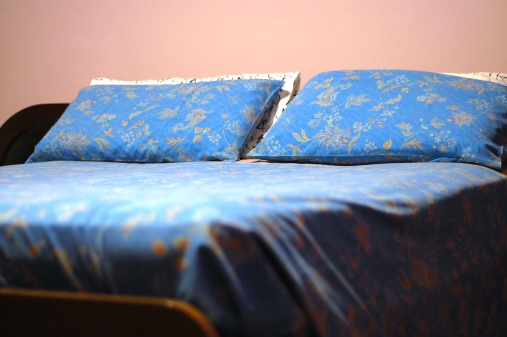 Postel nebo postele na pokoji v ubytování Liana Guest House