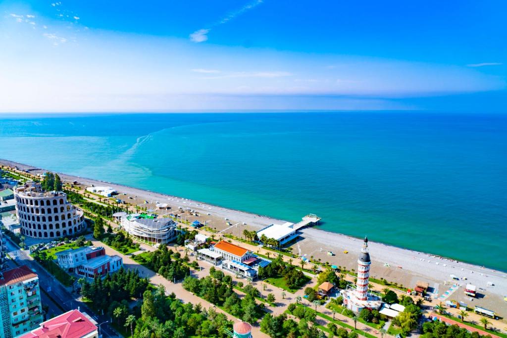 an aerial view of a beach and the ocean at ORBI CITY in BATUMI in Batumi