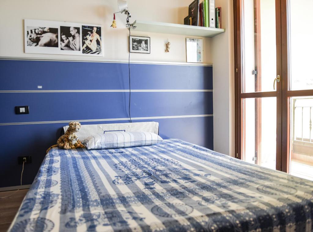 Postel nebo postele na pokoji v ubytování A Casa di Lidia 15 min dal Lago di Garda e Verona Centro Vicinissima Terme Acquardens
