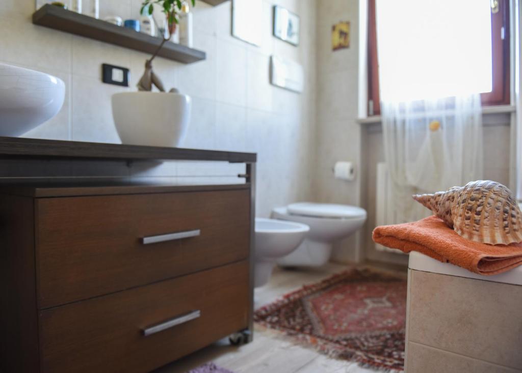 Koupelna v ubytování A Casa di Lidia 15 min dal Lago di Garda e Verona Centro Vicinissima Terme Acquardens