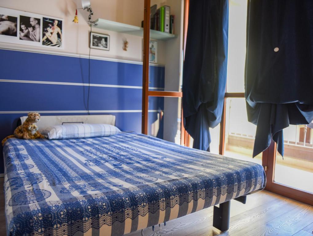 Postel nebo postele na pokoji v ubytování A Casa di Lidia 15 min dal Lago di Garda e Verona Centro Vicinissima Terme Acquardens