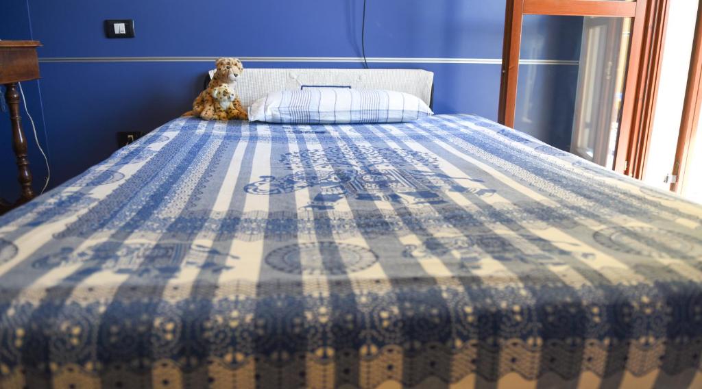 Postel nebo postele na pokoji v ubytování A Casa di Lidia 15 min dal Lago di Garda e Verona Centro Vicinissima Terme Acquardens