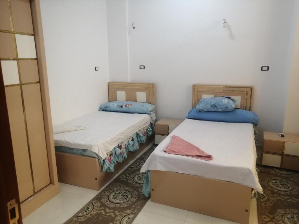 Postel nebo postele na pokoji v ubytování Nubian Bride guest house
