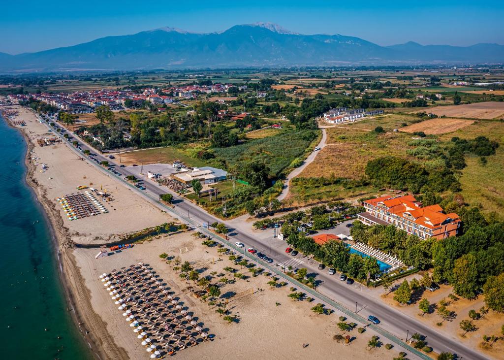 an aerial view of a beach with a resort at Hotel Giannoulis in Paralia Katerinis
