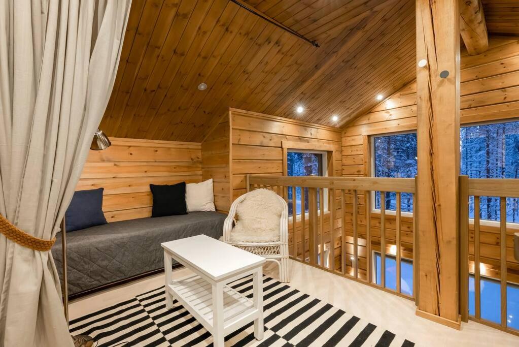 Posezení v ubytování Charming log house - Lumous B - Pyhätunturi - Finland