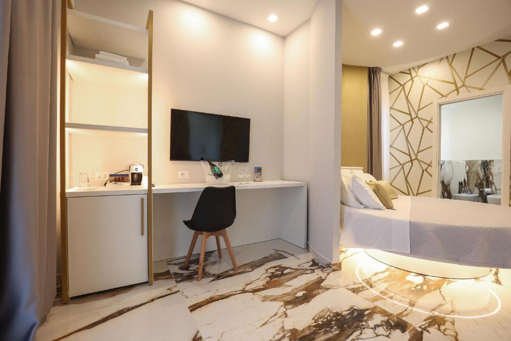 TV a/nebo společenská místnost v ubytování Hotel Cenisio