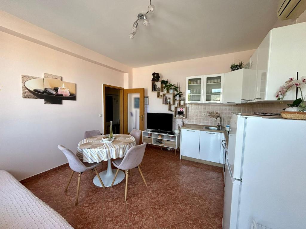 A cozinha ou cozinha compacta de Apartments Korta