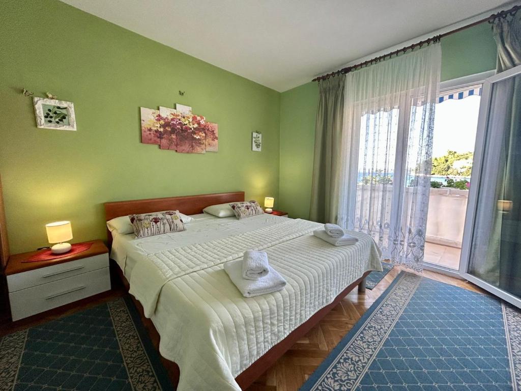 Cama ou camas em um quarto em Apartments Korta