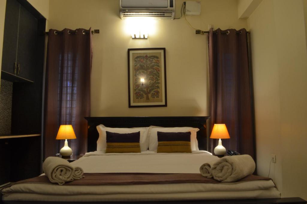 Krevet ili kreveti u jedinici u okviru objekta Luxtay Suites