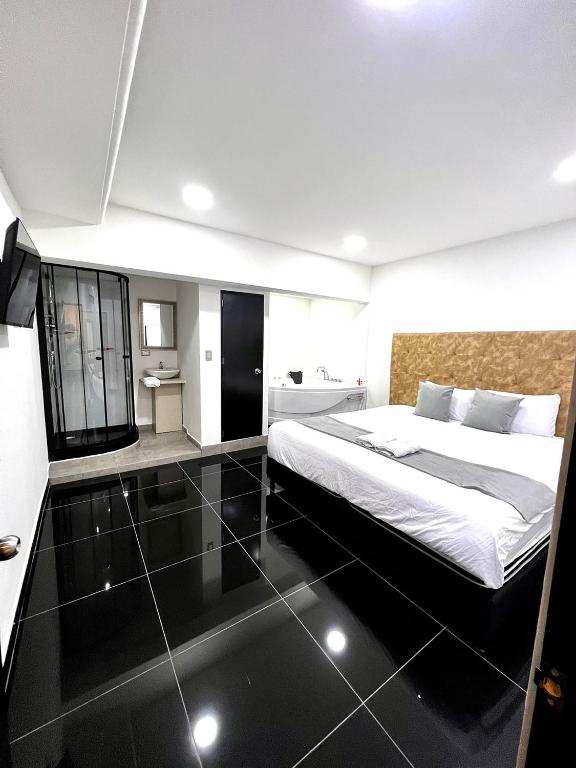 Kuchyň nebo kuchyňský kout v ubytování Orbe Hotel Medellín