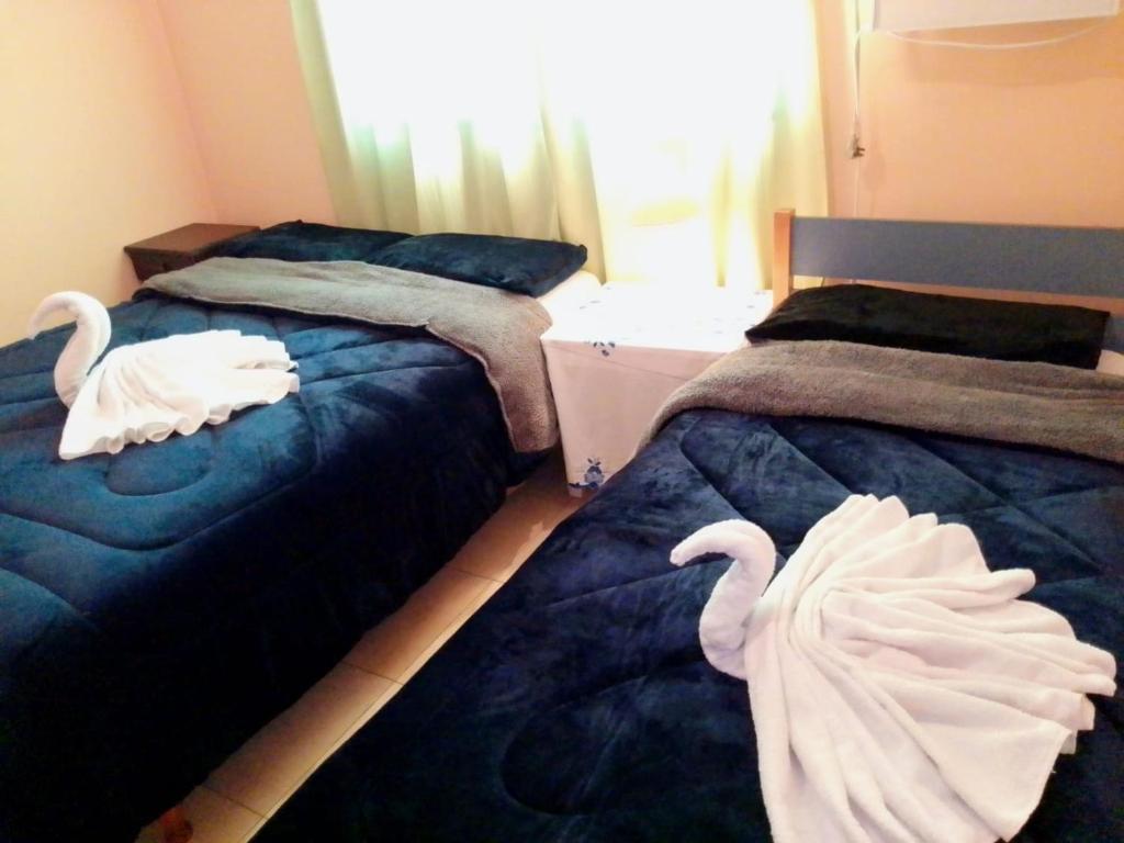 Tempat tidur dalam kamar di Costa Posadas