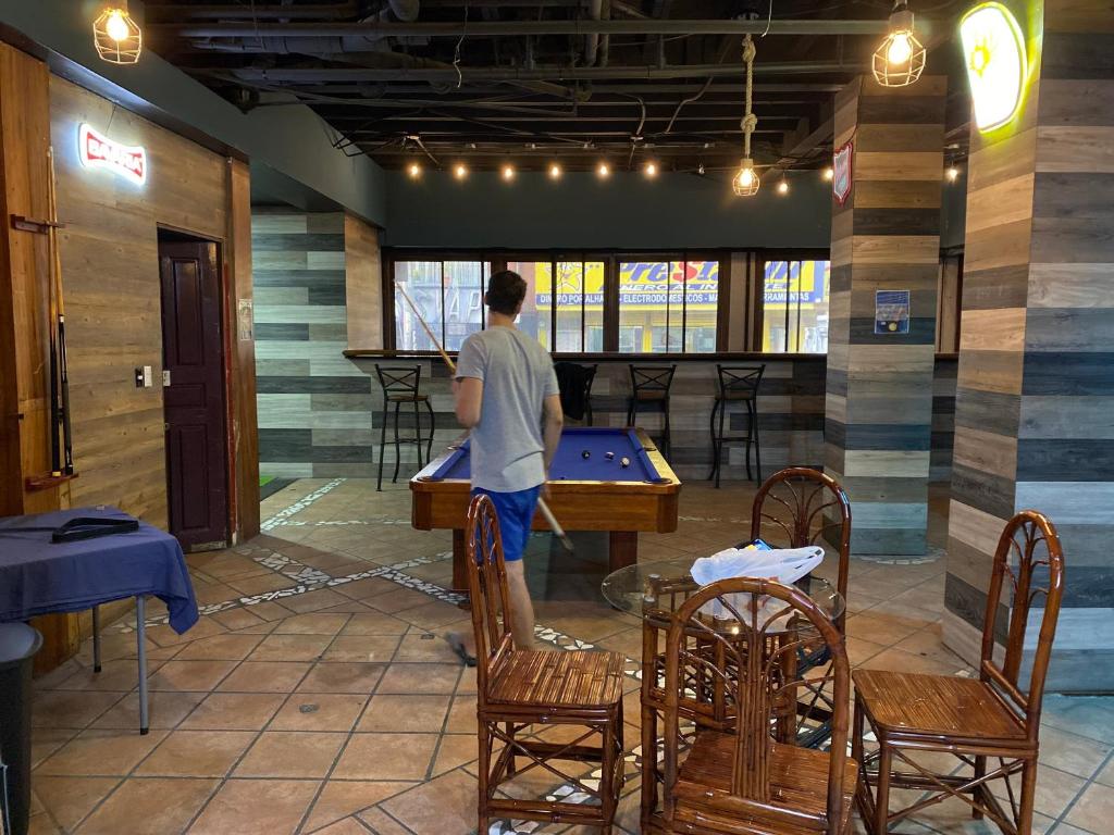 Posezení v ubytování Alajuela Backpackers Airport Hostel