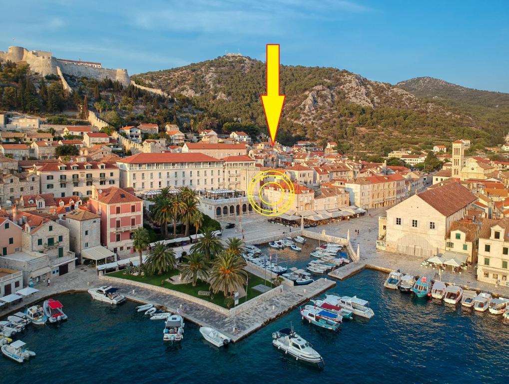 an aerial view of a city with a ferris wheel at Main Square Apartment in Hvar