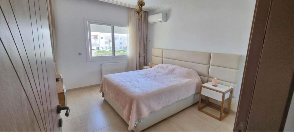 Postel nebo postele na pokoji v ubytování Super appartement avec 5 piscines en résidence