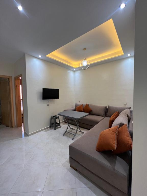 TV a/nebo společenská místnost v ubytování Auberge golden wave imsouane