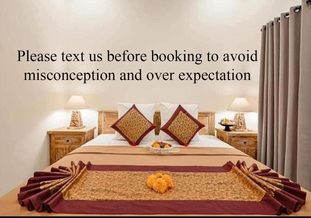 Кровать или кровати в номере Ditha Guest House