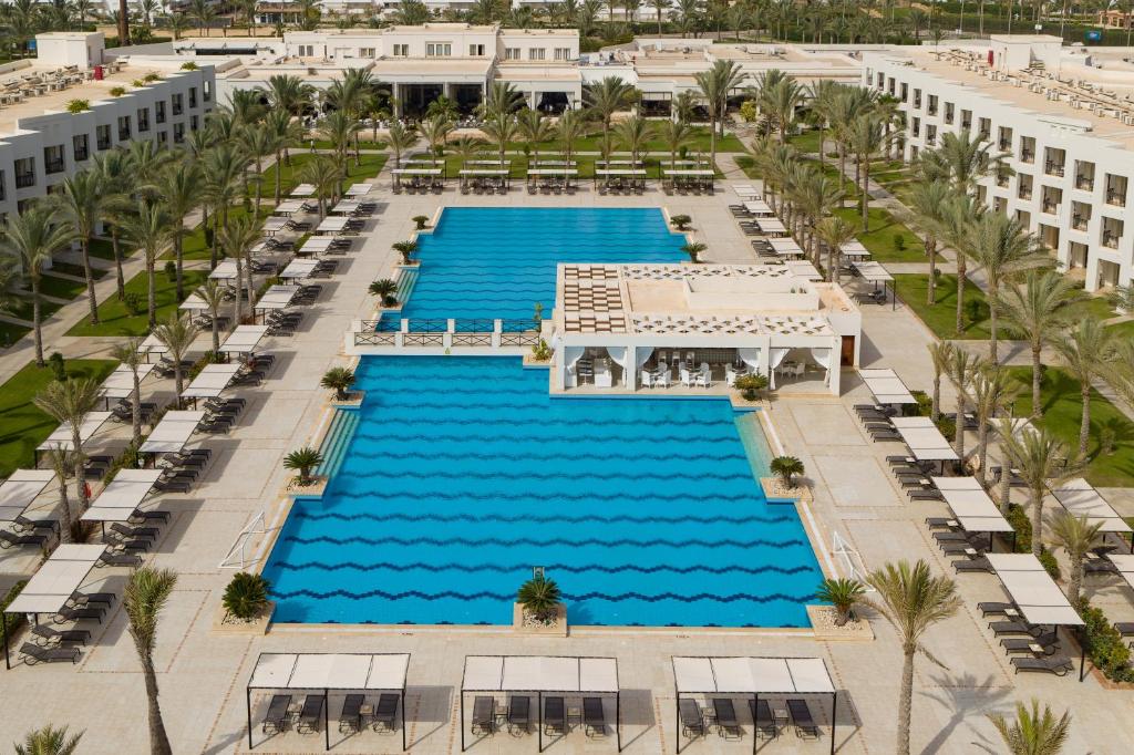 an aerial view of the pool at the resort at Jaz Crystal, Almaza Bay in Marsa Matruh