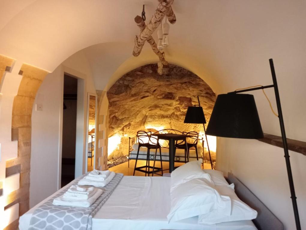 Postel nebo postele na pokoji v ubytování IBLA ROOMS