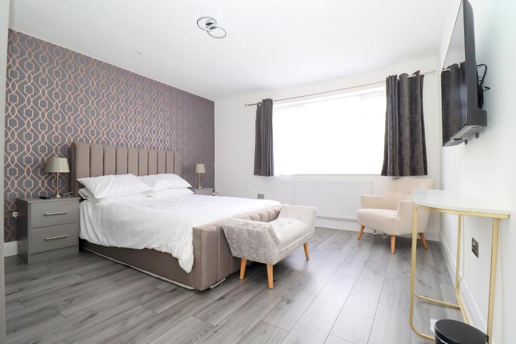 En eller flere senge i et værelse på Crawley House