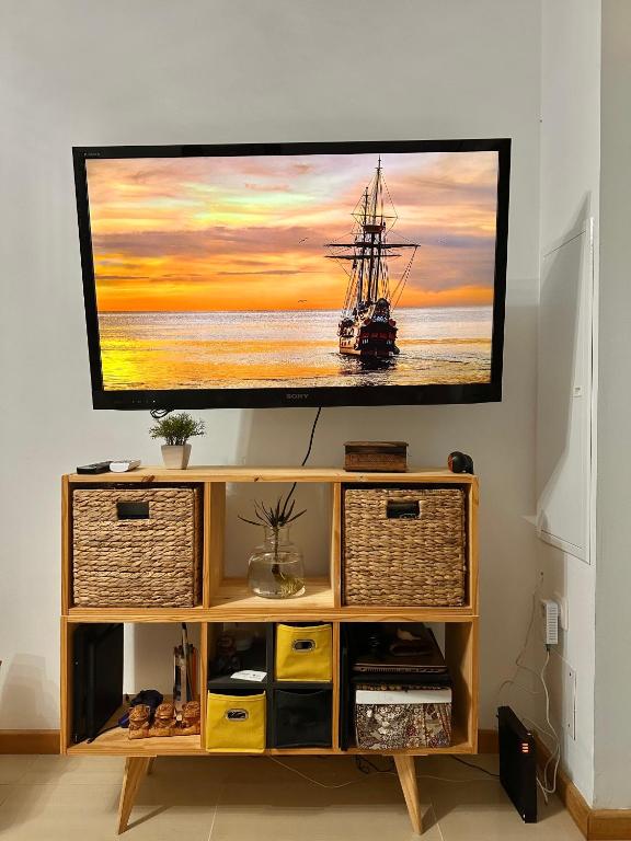 TV a/nebo společenská místnost v ubytování AFRICA