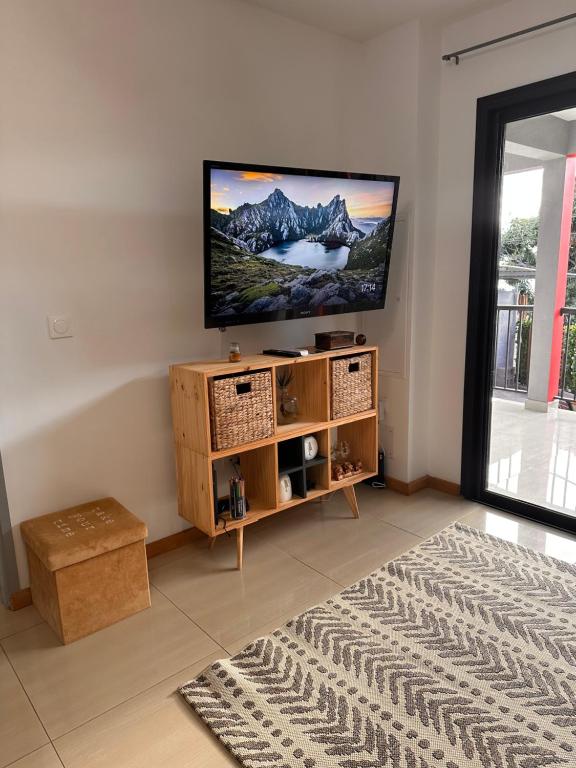 TV a/nebo společenská místnost v ubytování AFRICA